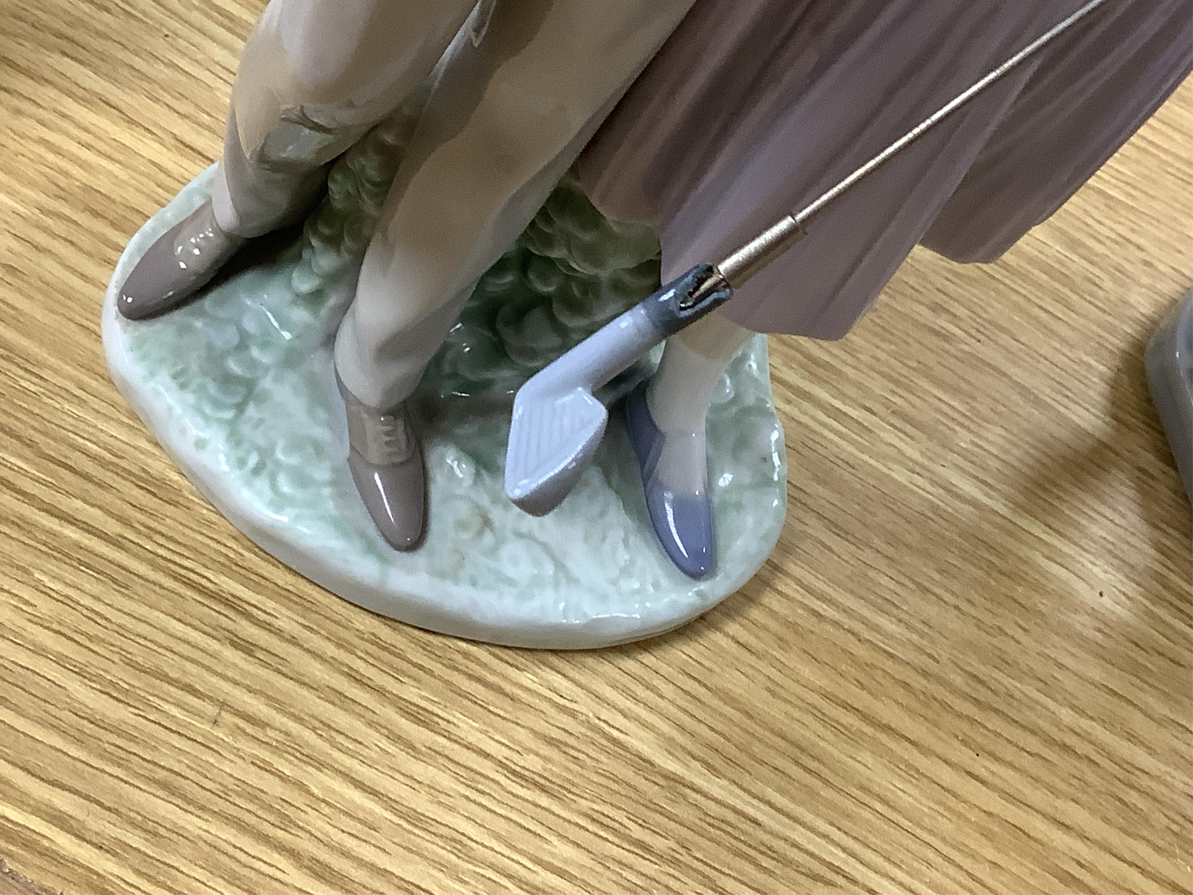 A large Lladro figure group of three ballet dancers by a tall floral column and eight other Lladro figures including a model of a bell. Tallest figure group 45cm high. Condition - golfer group, golf clubs broken.